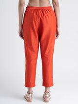 Buy Orange Tapered Leg Chanderi Trousers Online | Pinkfort